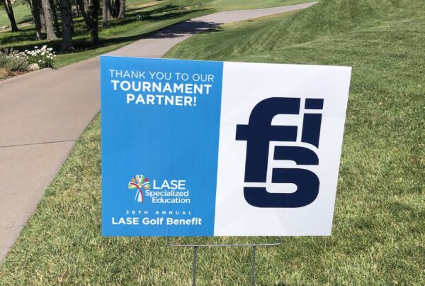 LASE specialized education golf tournament sign thanking FSI for partnering with the event