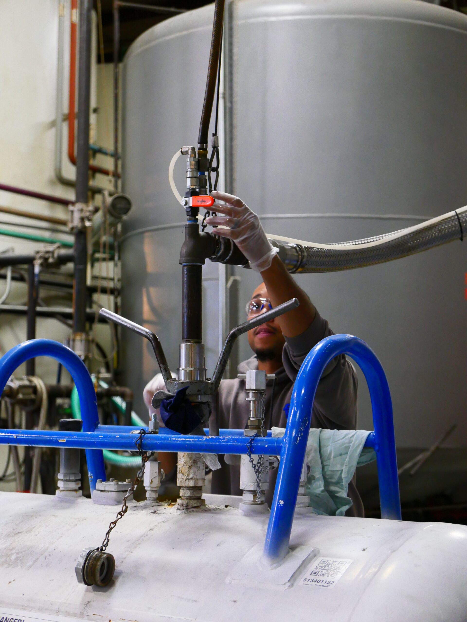 Todd Keske, Leading FSI into a Sustainable Future 3 Service technician filling tank with chemical for transporting to customer for producing polyurethane