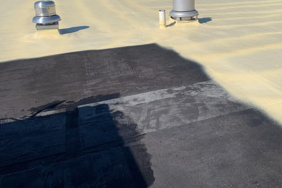 seal spray on roof of warehouse for insulation and increase energy efficiency