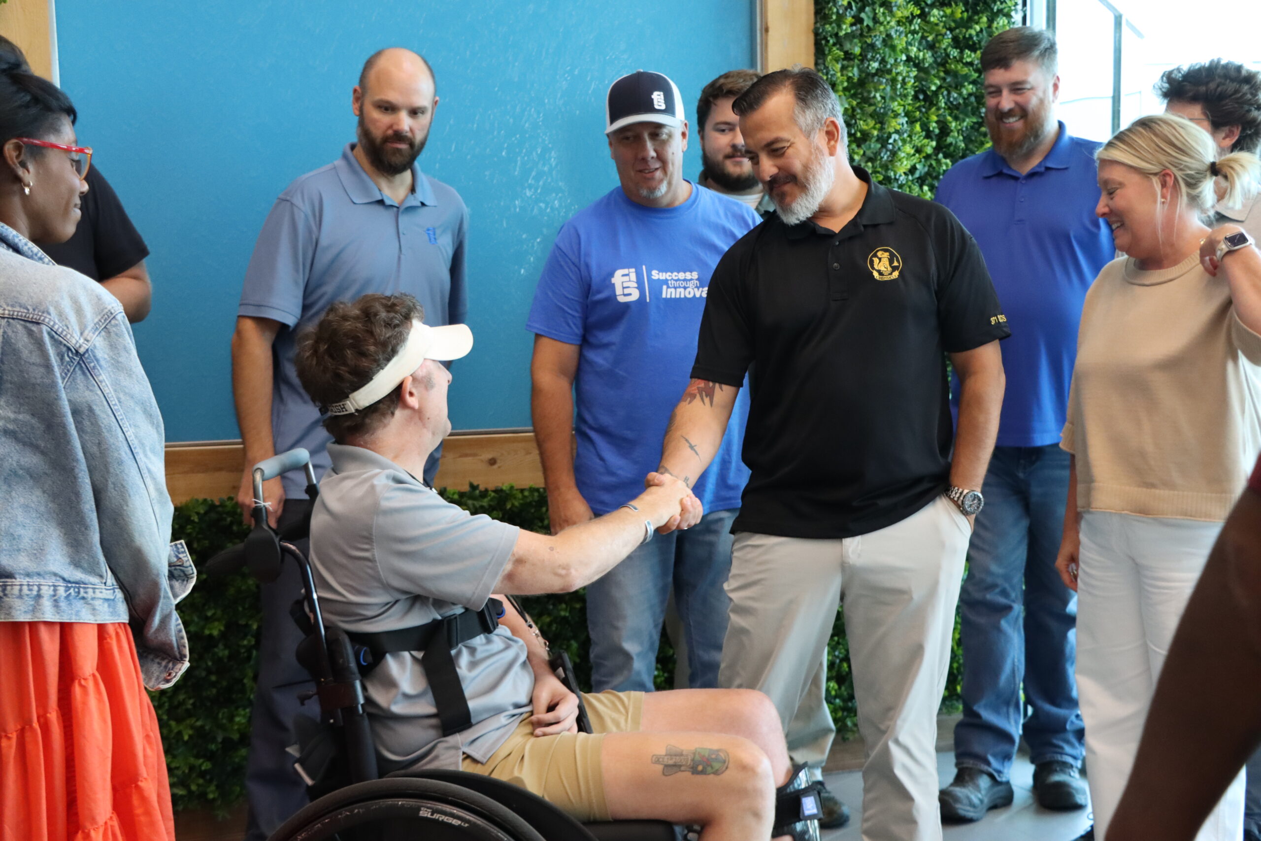 Sergeant First Class Cory Remsburg with his father Craig speaking at FSI headquarters, sharing his story of service, sacrifice, and resilience as an Army Ranger.