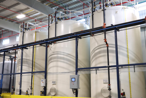 FSI chemical toll manufacturing facility with bulk tanks and equipment for high-volume polyurethane production and transloading services.