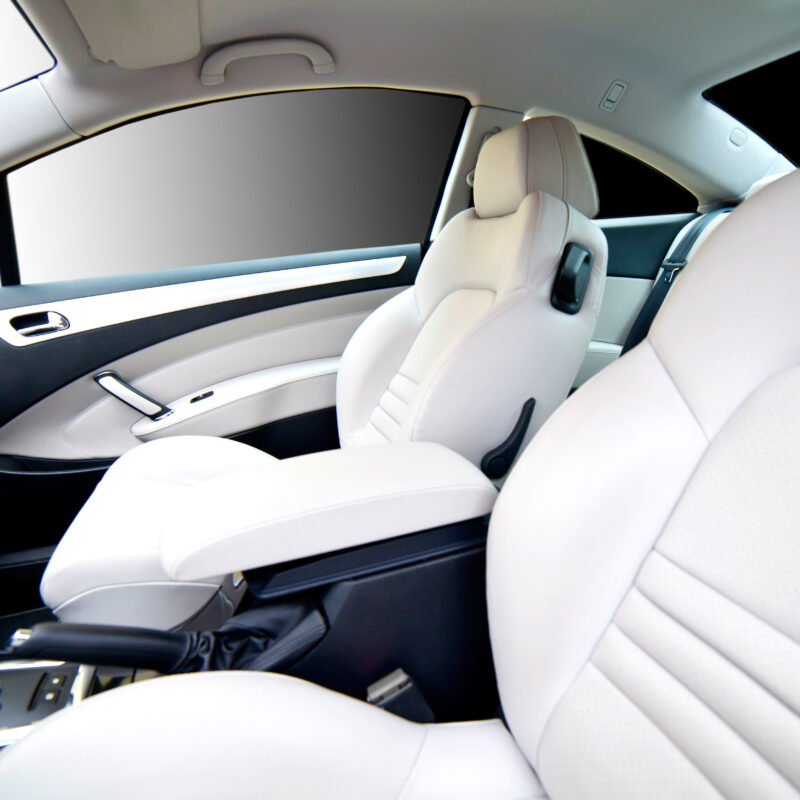 Interior of car with white leather seats produced from ecoflex integral skin flexible polyurethane foam